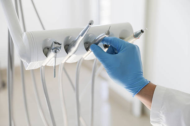 Professional Tooth Extraction technician working in Borden, IN